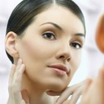 Girl looking in the mirror