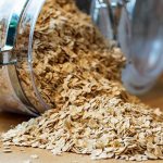 Cereals spilled from a glass jar
