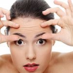 Wrinkles on a girl&#39;s forehead