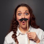 Woman with fake mustache